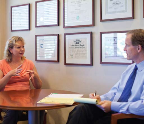 A physician consults with a guest at Canyon Ranch (Tucson, AZ). The spa offers a range of genomic tests including analyzing conditions caused by lifestyle.