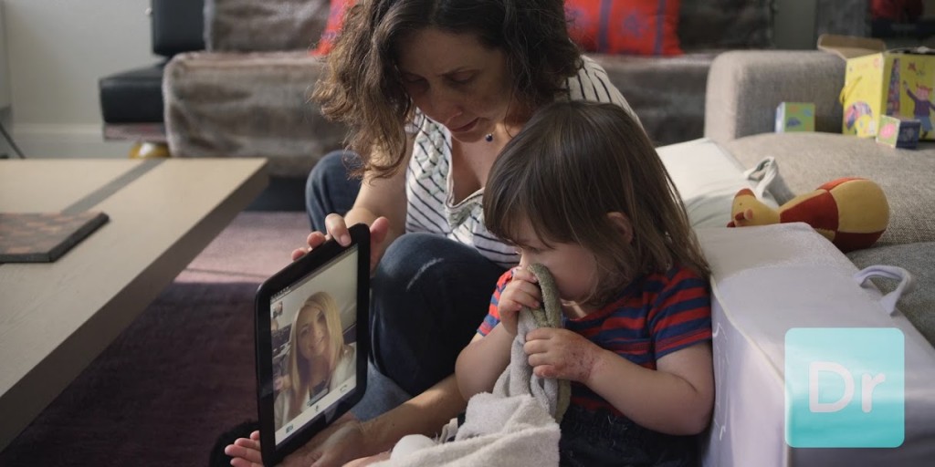 mom and toddler talking with doctor on demand on a tablet