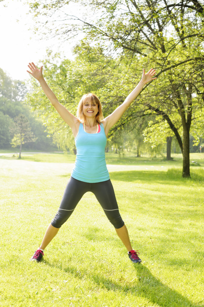 woman doing jumping jack