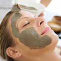 woman receiving an exfoliating facial