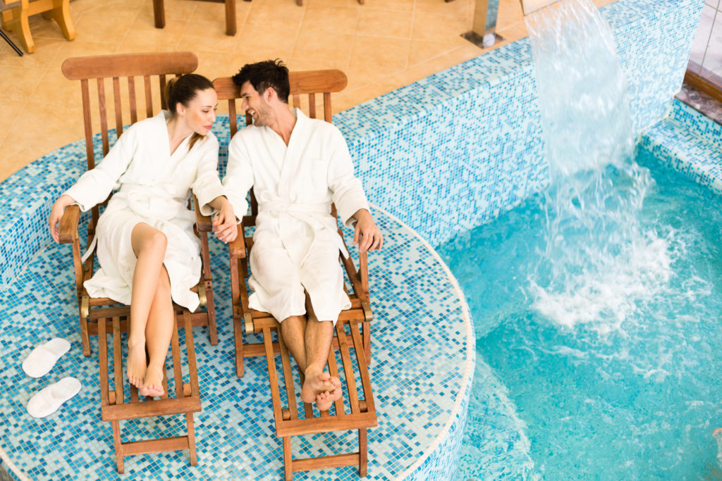 couple-lounging-poolside