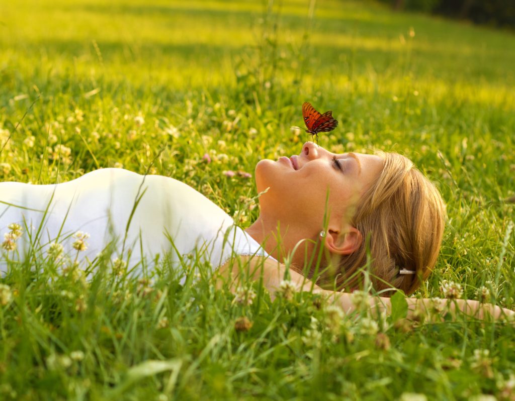 woman-relaxing-butterfly-nose