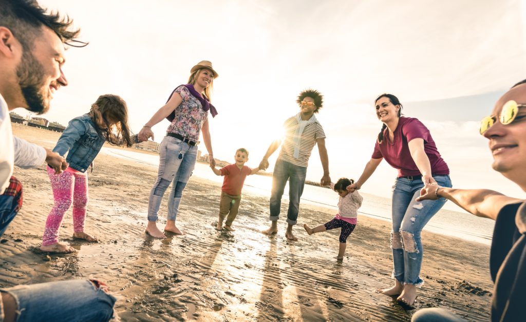 families-holding-hands-beach