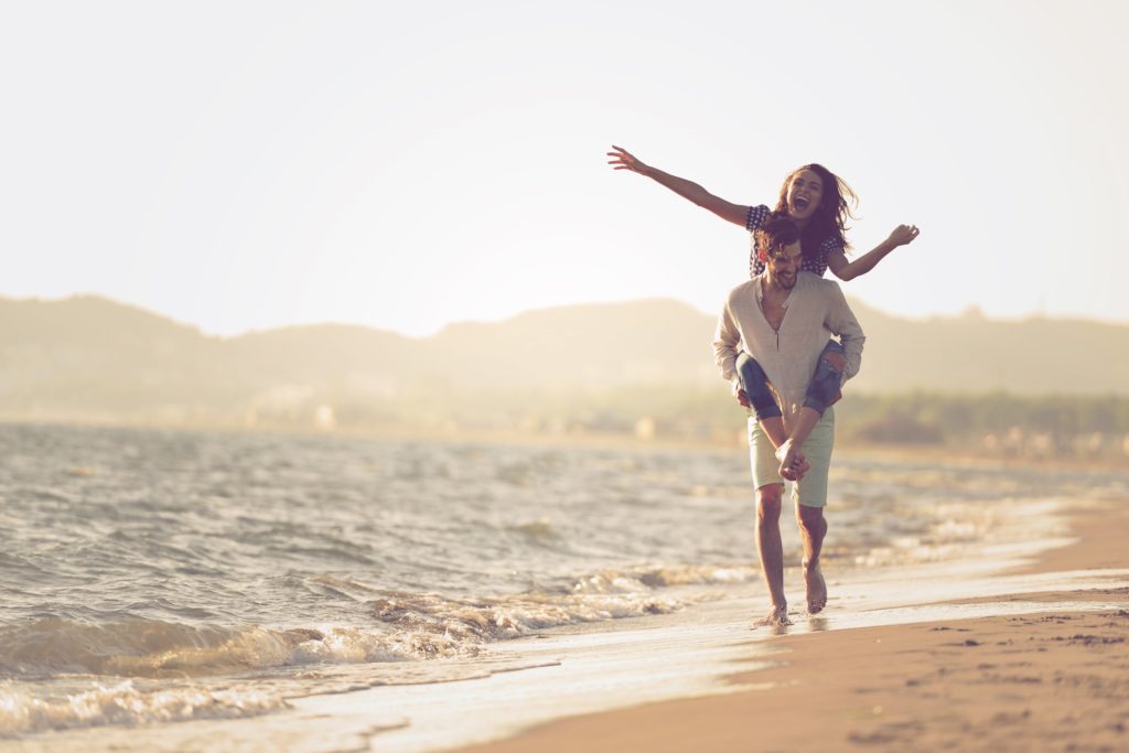 couple-playing-beach