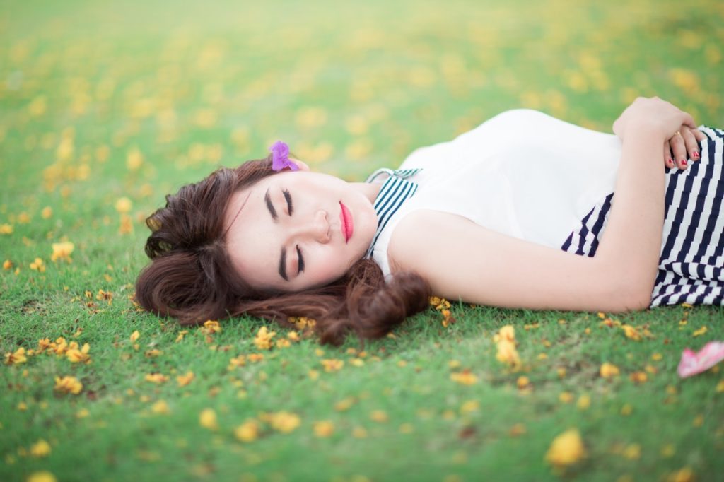 woman-relaxing-grass