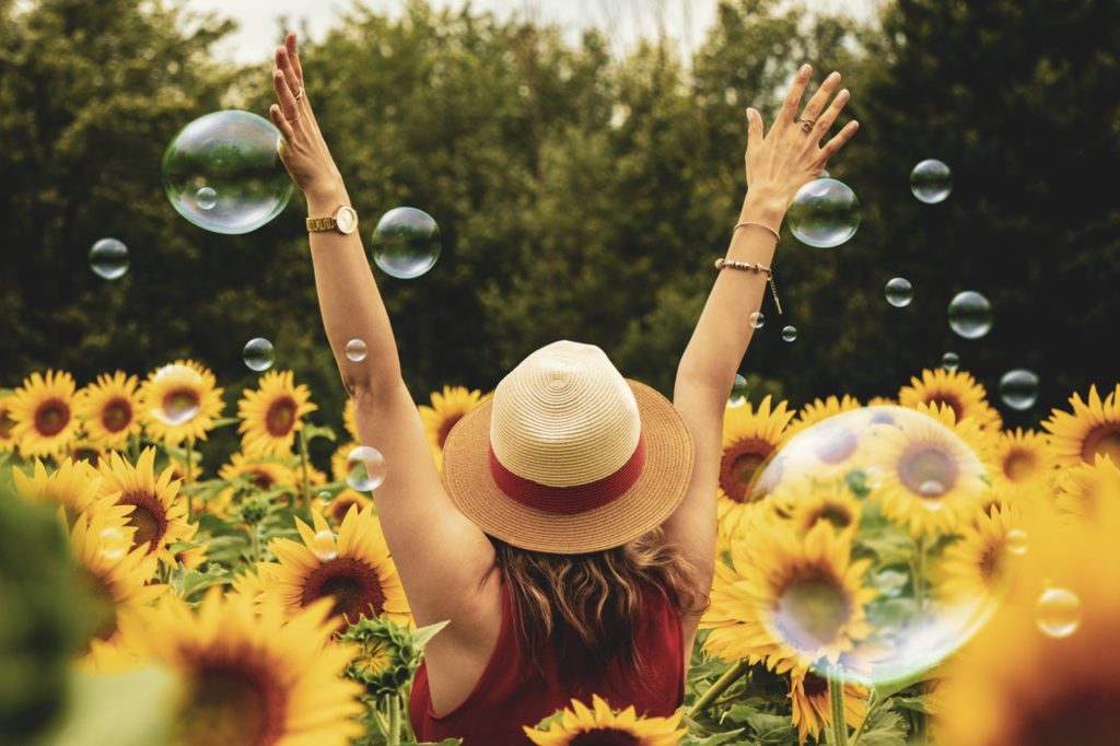 woman-sunflowers-bubbles