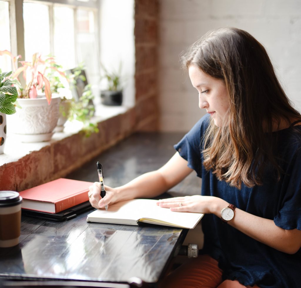 woman-writing-journal