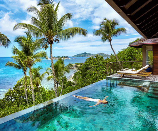 woman-floating-pool-tropical