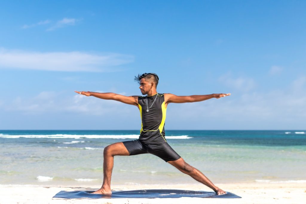 man-yoga-beach