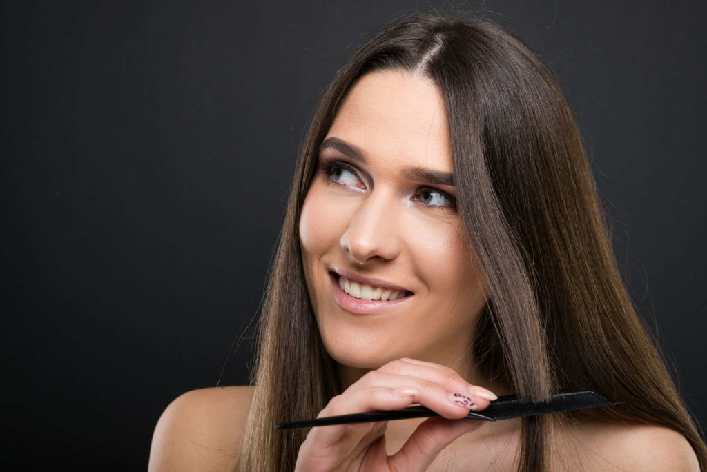 woman-combing-hair