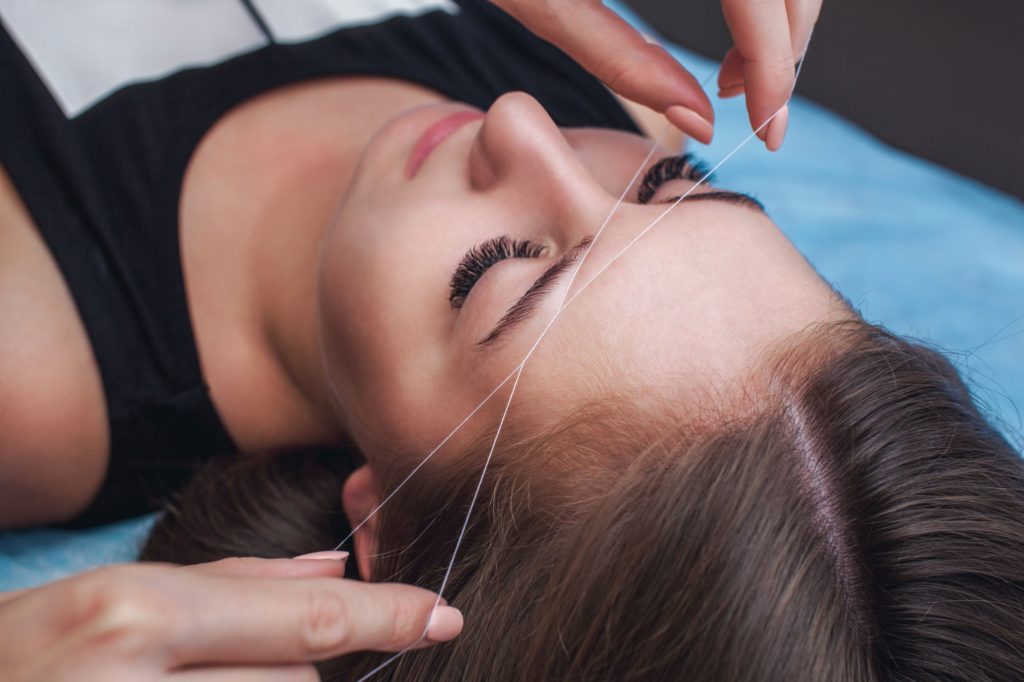 woman-threading