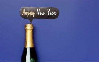 happy new year gift card with image of champagne bottle
